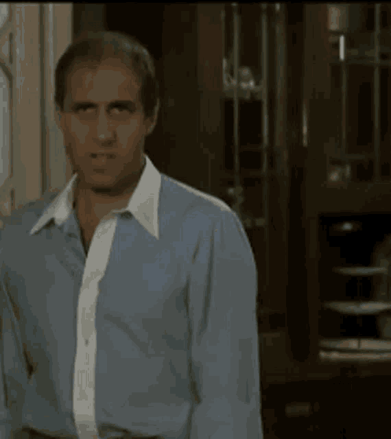 Adriano Celentano Shirt Off GIF.