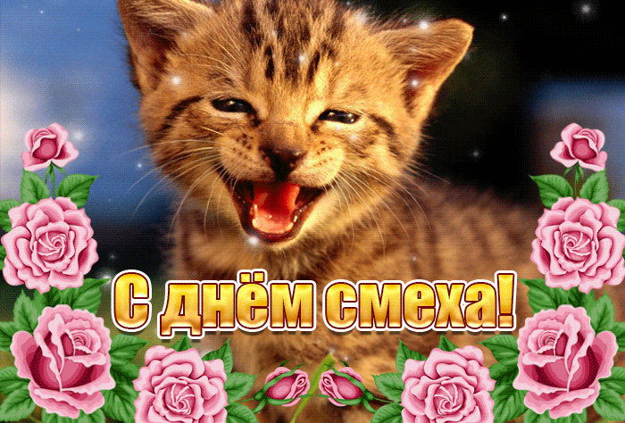 Забавный котёнок в цветах.